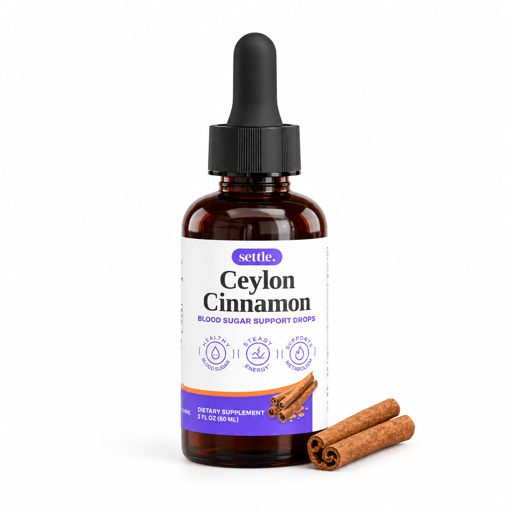 Cinnamon Drops bottle with cinnamon sticks